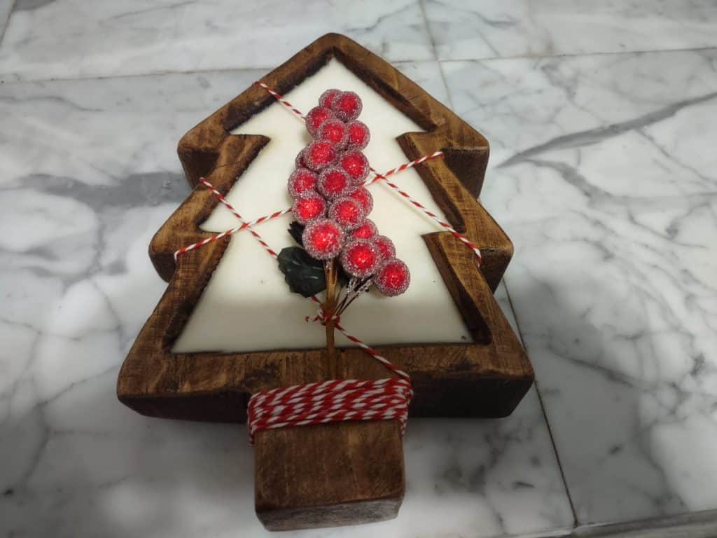 Christmas Tree Candle Christmas candle in the shape of a tree with fake cranberries in the middle